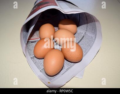 Easter  design with eggs and newspapers Stock Photo