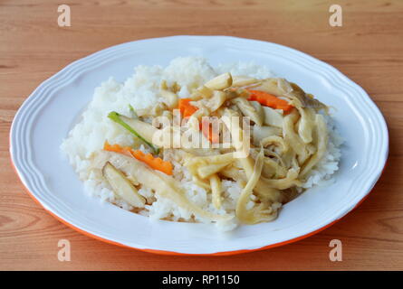 stir fried Indian mushroom and carrot on plain rice Stock Photo