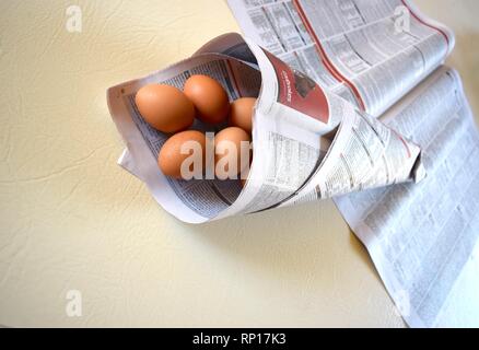 Easter  design with eggs and newspapers Stock Photo