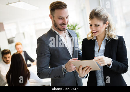 Business people working together on project and brainstorming in office Stock Photo
