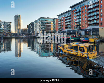 Water taxi arriving from the railway station at Leeds Dock in Leeds West Yorkshire England