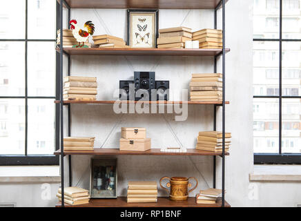 Compact music center in vintage residential loft interior on the shelf Stock Photo