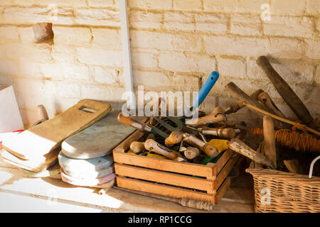 Some garden tools in a shed, United kingdom Stock Photo