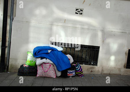 Homeless persons belongings left unattended on the street. Stock Photo