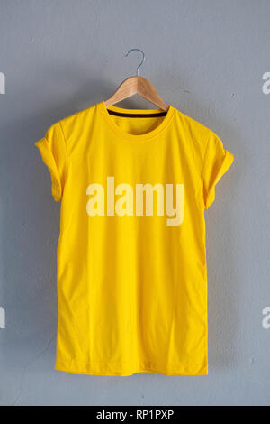 Download Blank Yellow T Shirt On Grunge Background Stock Photo Alamy Yellowimages Mockups