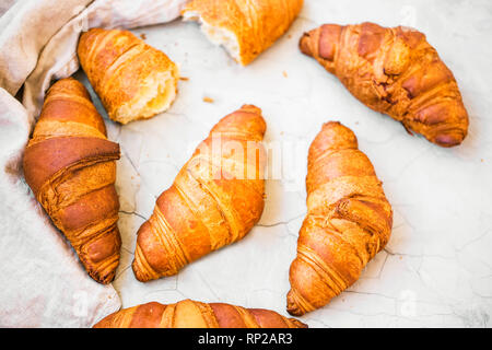 Freshly baked croissants top view, fresh french croissants, breakfast buns Stock Photo