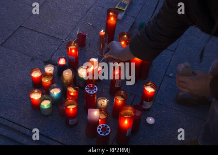 Madrid, Spain. 20th Feb, 2019. A demonstrator seen lighting candles during the protest.Protest in Puerta del Sol of Madrid against the energetic poverty in Spanish families as a result of the economic crisis defending a model of clean energy and under social control. It is estimated that 6.8 million people suffer from energy poverty in Spain. Credit: Lito Lizana/SOPA Images/ZUMA Wire/Alamy Live News Stock Photo