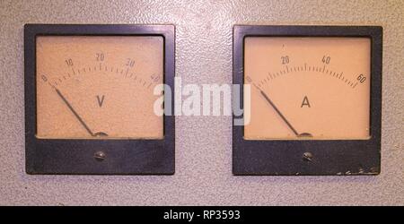 Analog ampere meter or amp meter and analog voltmeter. Stock Photo