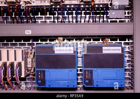 Image shows control cubicle. Electric device - burner control inside power case. Stock Photo