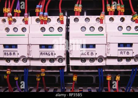 Image shows control cubicle. Electric contactors inside power case. Stock Photo