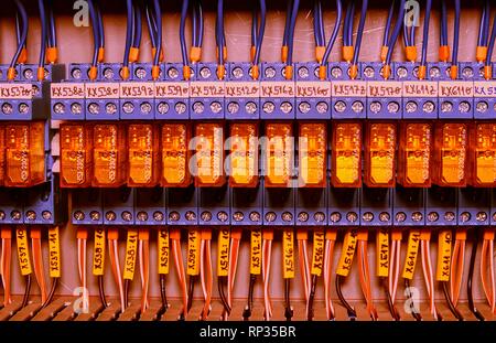 Relay actuators inside the industrial power case Stock Photo