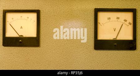 Analog ampere meter or amp meter and analog voltmeter. Stock Photo