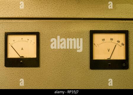 Analog ampere meter or amp meter and analog voltmeter. Stock Photo