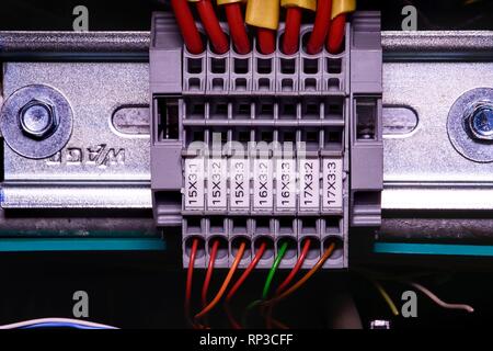 Modern terminal blocks with multi colored wires.  Stock Photo