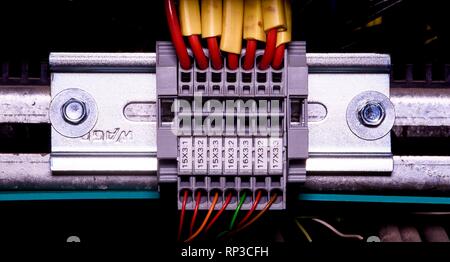 Modern terminal blocks with multi colored wires.  Stock Photo