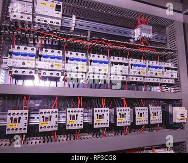 Image shows circuit breakers and electrical contactors. Close-up. Modern distribution case. Contorl cubicle Stock Photo