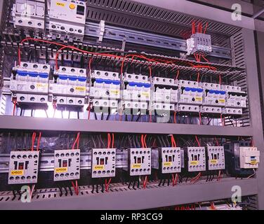 Image shows circuit breakers and electrical contactors. Close-up. Modern distribution case. Contorl cubicle Stock Photo