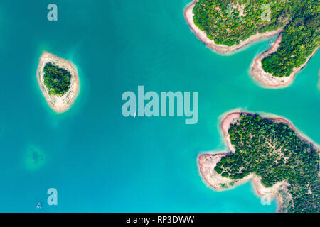 (View from above) Stunning aerial view of a beautiful group of island in Nam Ngum Reservoir in Thalat located in northern Laos. Stock Photo