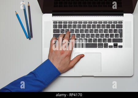 Cropped image of businessman working on his laptop. top view Stock Photo