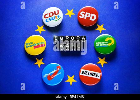 Stroke European choice on EU flag and Anstecker of German parties, Schriftzug Europawahl auf EU-Fahne und Anstecker deutscher Parteien Stock Photo