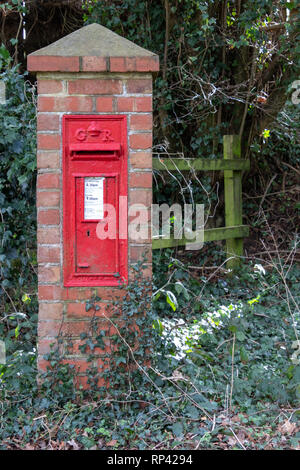 CRAWLEY DOWN, WEST SUSSEX/UK - FEBRUARY 20 : Old red pillar box in Crawley Down, West Sussex on February 20, 2019 Stock Photo