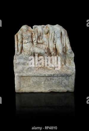 Roman Sebasteion relief  sculpture of an Heroic Couple Aphrodisias Museum, Aphrodisias, Turkey.   Against a black background.  A heroine sits on a roc Stock Photo