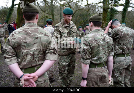 The Duke of Sussex carries out a Green Beret presentation during a visit to 42 Commando Royal Marines at their base in Bickleigh. Stock Photo