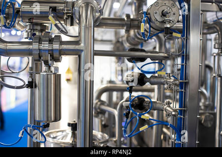 Stainless steel pipes in the factory. Stock Photo