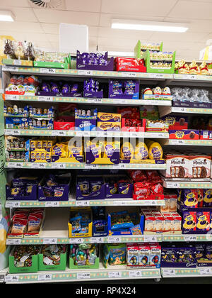 Manchester, UK - Feb 18th, 2019: Selection of different chocolate easter eggs on shelves in a shop store before the Easter holidays. Stock Photo
