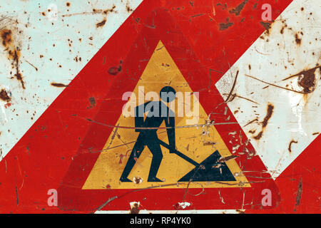 Old road works sign on construction site Stock Photo