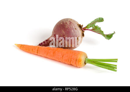 Carrot and beetroot with leaf isolated on white background. Stock Photo