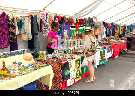 Souvenir stalls on seafront, Dame Mary Eugenia Charles Blvd, Roseau, Dominica, Lesser Antilles, Caribbean Stock Photo