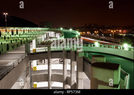 Interior and exterior views of the Hydro multistory car park building illuminated at night clydeside Glasgow city Scotland UK Stock Photo