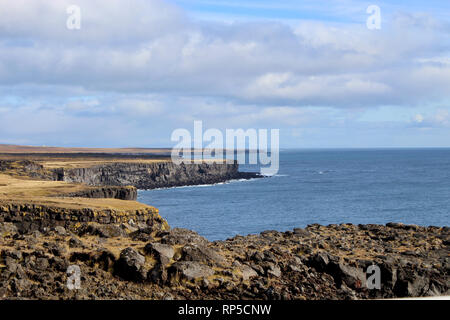 Beautiful Cliffs of Svalpufa-Pufubjarg Londrangar in Iceland. Stock Photo