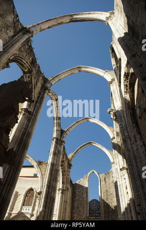 Ruined church of the former Carmo Convent (Convento do Carmo) in Lisbon, Portugal. The church was destroyed in the Great Lisbon earthquake in 1755 and never restored. Stock Photo