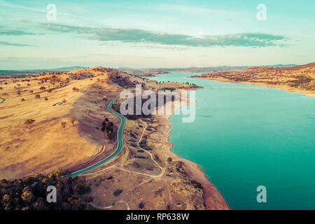 Aerial view of Riverina Highway along Lake Hume and Murray River at sunset. New South Wales, Australia