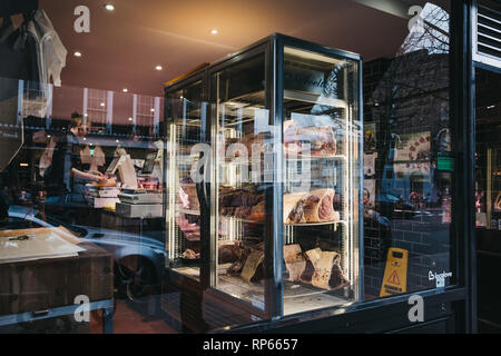 London, UK - February 16, 2019: Meat on retail display of Primrose Hill Butchery in Primrose Hill, an upscale area of North London that got its name f Stock Photo