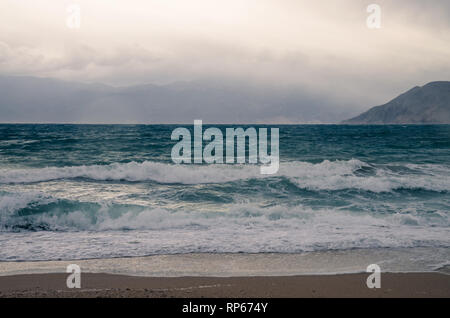 big waves in the sea and pebble beach Stock Photo