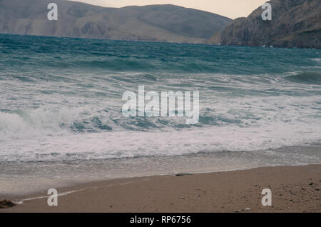 big waves in the sea and pebble beach Stock Photo