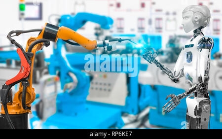 Humanoid robot with welding robot in an industrial of smart factory, Future technology concept Stock Photo