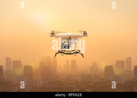 Drone flying to measure dust particles in the air over metropolis, Technology 4.0 concept Stock Photo