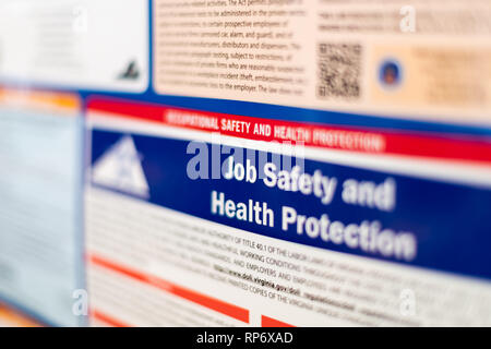 Fairfax, USA - September 29, 2018: Job Safety and Health Protection sign on board post information in Virginia office Stock Photo
