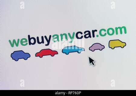 The logo of WeBuyAnyCar is seen on a computer screen along with a mouse cursor (Editorial use only) Stock Photo