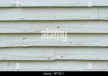 Detail of a white clapboard wall from an old house Stock Photo