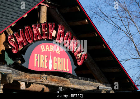 A logo sign outside of a Smokey Bones Bar and Fire Grill restaurant location in Fredericksburg, Virginia on February 19, 2019. Stock Photo