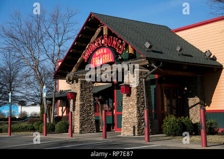 A logo sign outside of a Smokey Bones Bar and Fire Grill restaurant location in Fredericksburg, Virginia on February 19, 2019. Stock Photo