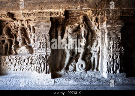 Carved statues of pig and goddess at ancient besrelief in Ellora cave near Aurangabad, Maharashtra, India Stock Photo
