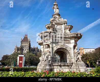 Flora Fountain and Oriental Old Building at blue sky in sunny at fort area in Mumbai, Maharashtra, India Stock Photo