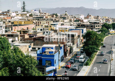 View of a neighbourhood with mountains in the background in Arequipa, Peru. Stock Photo