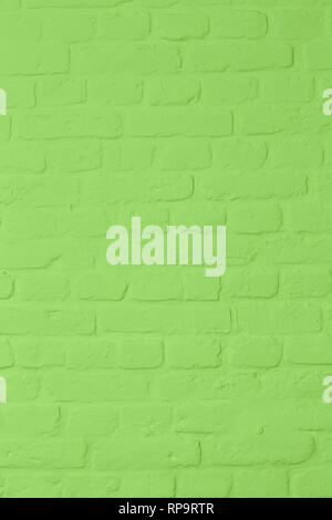 Pastell bright green colored brickstone wall, full frame, image background Stock Photo